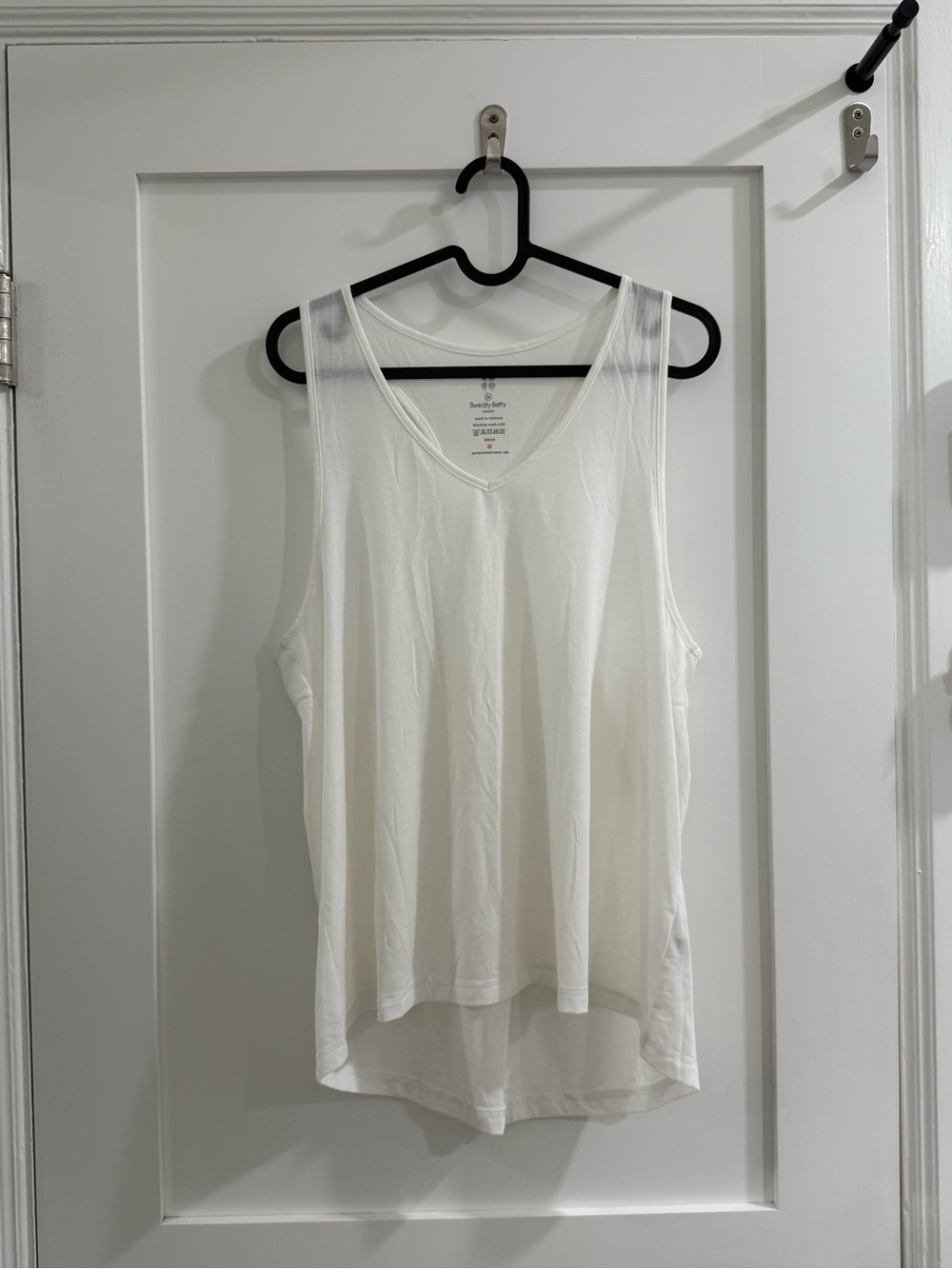Sweaty Betty white racerback sheer tank w/ split back